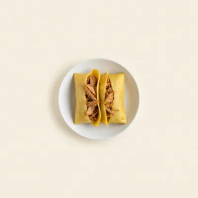 Tamales de maïs au porc