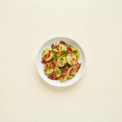 Salade tiède de pommes de terre au lardon