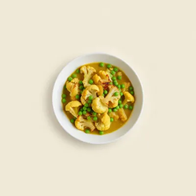 Curry de chou-fleur aux petits pois