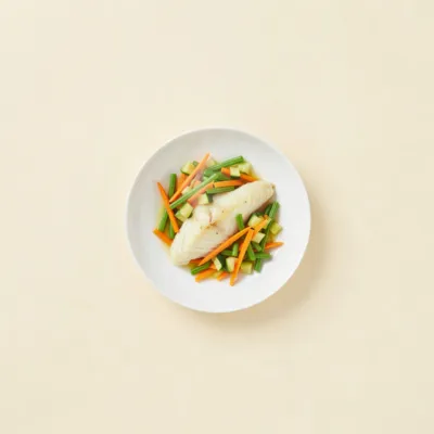 Colin en papillote aux petits légumes